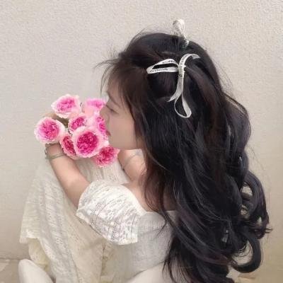 萝美
